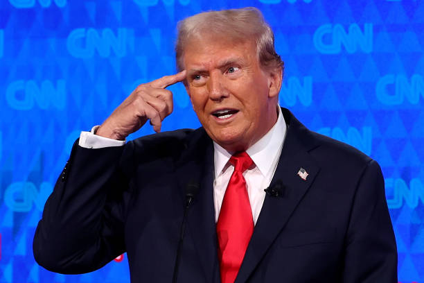 Republican presidential candidate, former U.S. President Donald Trump participates in the CNN Presidential Debate at the CNN Studios